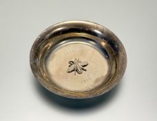 A Hamilton & Inches, Edinburgh silver coin dish with cast honey bee to centre and engraved dates