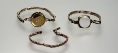 Two 9ct gold vintage watch cases with 9ct gold expanding bracelets - one with glass panel and a
