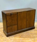 A Whytock & Reid of Edinburgh early 20thc. stained oak bookcase with pull out slide, a pair of large