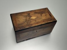 A 19th Century bur walnut inlaid tea caddy, the interior with two fitted compartments and