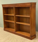A reproduction yew open bookcase, moulded cornice over six adjustable shelves to front, flanked by