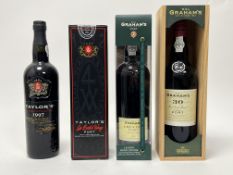 A bottle of W&J Graham's aged 30 years Tawny Port 20% 75cl, in wooden presentation port, together