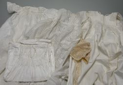 A collection of various vintage christening gowns/dresses in various embroidered trimmings and