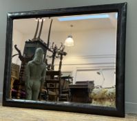 A rectangular brown leather framed bevelled edge hall mirror. (106x139cxm)
