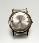 A vintage Rotary 9ct gold presentation manual wind wristwatch with silvered dial and baton hour