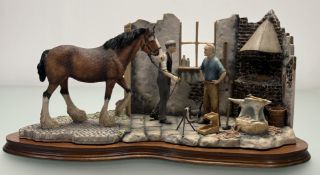 A Border Fine Arts group figurine titled New Shoes for Dolly, by Elizabeth MacAllister, limited