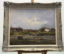 James Wright, Low Tide docked boats with houses and figure, oil on canvas, signed bottom right, in a