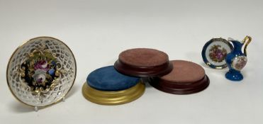 A collection of miscellaneous items comprising a Limoges porcelain small plate with courting