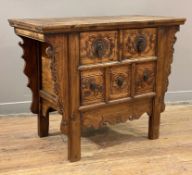 A Chinese carved elm altar cabinet, rectangular top over five carved drawers to front flanked by