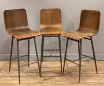 A set of three mid-century bar stools, bentwood seats on tubular steel supports and 'H'