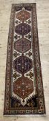 A modern hand-knotted Persian Meshkin runner, central panel with five hexagonal medallions featuring