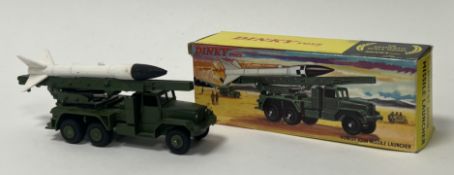 A Dinky Toys Military 665 Honest John Missile Launcher, to include plastic platform and hubs with