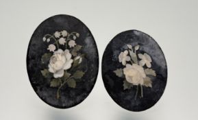 A late 19thc Italian grand tour black marble oval panel with inlaid white marble rose, green