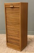 A mid-century teak filing cabinet by Durrant, tambour door to front enclosing ten filing drawers