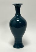 A 20th Century blue teal glazed vase of tapered form, Qianlong mark to base (h. 33cm)