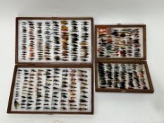 A collection of salmon and sea trout flies in two wooden boxes, approximately 320 mostly unused (a