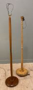 Two similar hardwood standard lamps, column supports raised on circular base (plugs removed, one