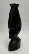 A vintage hand-carved African ebony bust of elongated form (h. 36.5cm)