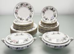 A Royal Worcester June Garland pattern part dinner service comprising, two lidded tureens, nine