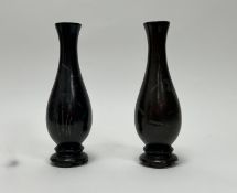 A pair of Japanese Meiji period bronze vases with inlaid decoration of bamboo, foliage, and Japanese