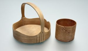 A Scandinavian Norwegian bentwood basket with braided sides, initaled AR with together with a