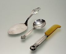 A Georg Jensen Danish sterling silver horn bladed butter knife: l. 14.5cm 22.4g and a Georg Jensen