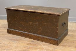 An early 20th century pine blanket chest, plank top lifting to reveal storage to interior, with