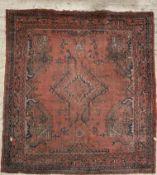 A hand-knotted Turkish Oushak rug, central medallion surrounded by geometric patterns and enclosed