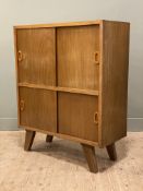 A mid-century teak filing cabinet, with two sets of sliding panel doors to front enclosing eight