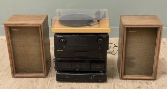 A modern stereo system, consisting of a Pro-Ject record turntable, a pair of Magnovoz speakers, amp,