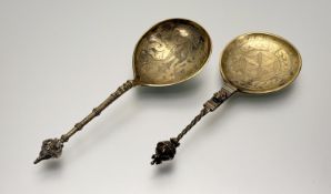 A Norwegian 830 standard gilt late 19th/ 20thc anointing spoon with orb finial, spiral twist