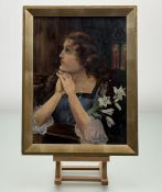 An Edwardian School, Portrait of a pre-raphaelite woman praying in a church with lilies, oil on