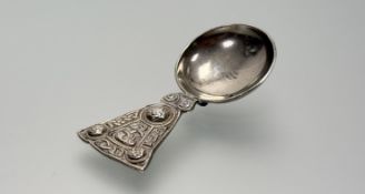 An Iona white metal Iain McCormick Celtic mythical sea serpant, targe and knot handled loose leaf