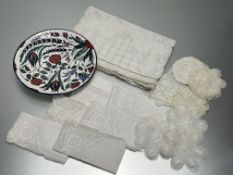 A collection of assorted lateVictorian embroidered table linen comprising lace-edged napkins,