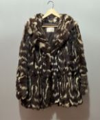 A Dominion Fur Co. Ltd., Churchill, Edinburgh fox fur two tone coat with brown silk lining (l. 82cm)