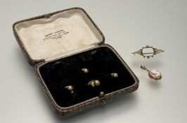 A set of four Henry Tatton vintage 9ct gold dress studs in original box 5.62g togther with an
