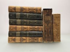 A set of 1-7 volumes of The Nouveau Larousse illustré published by Éditions Larousse with an
