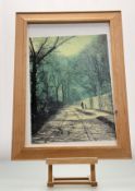 A print of a figure on a woodland path, in a glazed frame. (44.5cmx29cm)