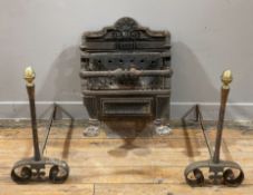 A 19th century cast iron fire grate, arched top with shell patera, raised on paw feet, together with