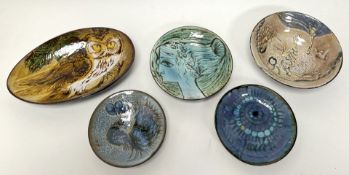 A collection of Chelsea Pottery footed dishes of varying sizes, comprising an oval dish decorated