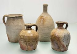 A collection of Early 19thc French Earthenware pottery comprising a wine decanter (h-28cm), a pot