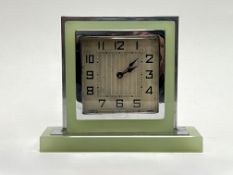 An Art Deco 1930s Uranium glass and chrome desk clock with Arabic numeral dial (h. 12cm), untested
