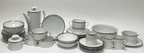 A Thomas of Germany part tea and dinner service with a silvered rim comprising a coffee pot, five