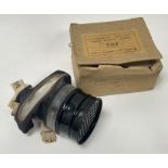 A WWII gas mask, bearing 'Lot 2157' to front, medium printed to side strap, issued by Glasgow A.R.P.