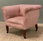 An Edwardian tub chair, upholstered in red and white striped fabric, rolled arms raised on tapered