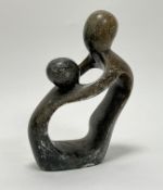 A contemporary hardstone sculpture of two figures embracing, possibly Zimbabwean (h. 22cm)
