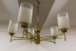 A modern mid-century style chandelier, five branches with cut glass shades on modernist brass frame: