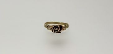 A yellow metal cast rose and leaf ring Q 1.85g