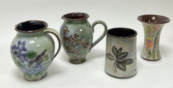 A collection of Chelsea Pottery vessels with varying foliate decoration, comprising a pair of