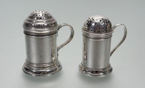 A London silver domed top individual sugar caster with scroll handle to side: h. x 8cm d. x 4cm